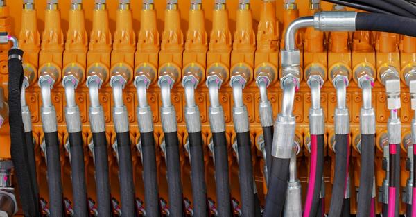 What does S-T-A-M-P-E-D in an industrial hose assembly mean?